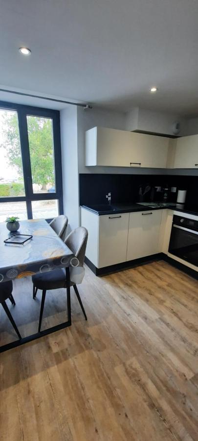 Les Appartements De La B Saint-Benoit-des-Ondes Exterior photo